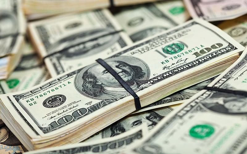 Dollar eyes monthly gain as markets look to Fed