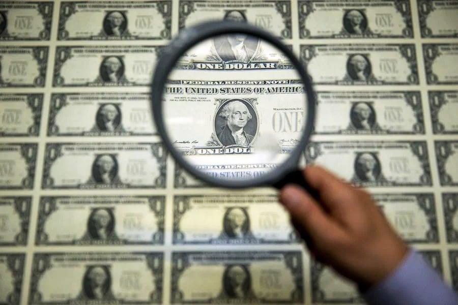Dollar hovers near 7-week high as Fed cut bets shift to May
