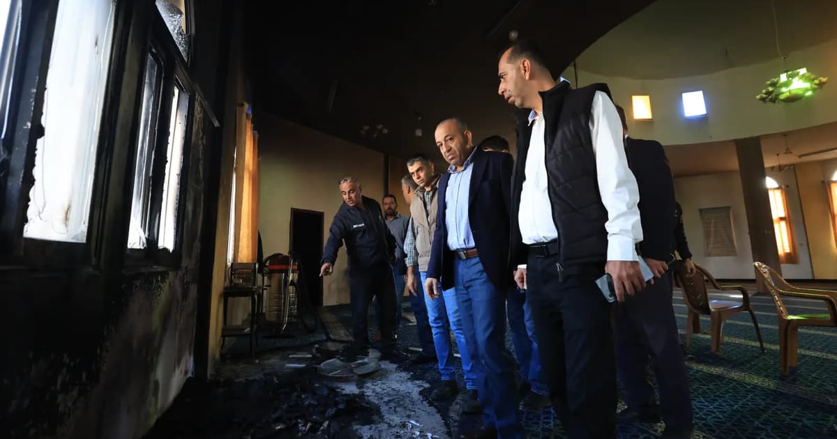 Israeli troops kill 2 West Bank Palestinians, settlers set mosque ablaze