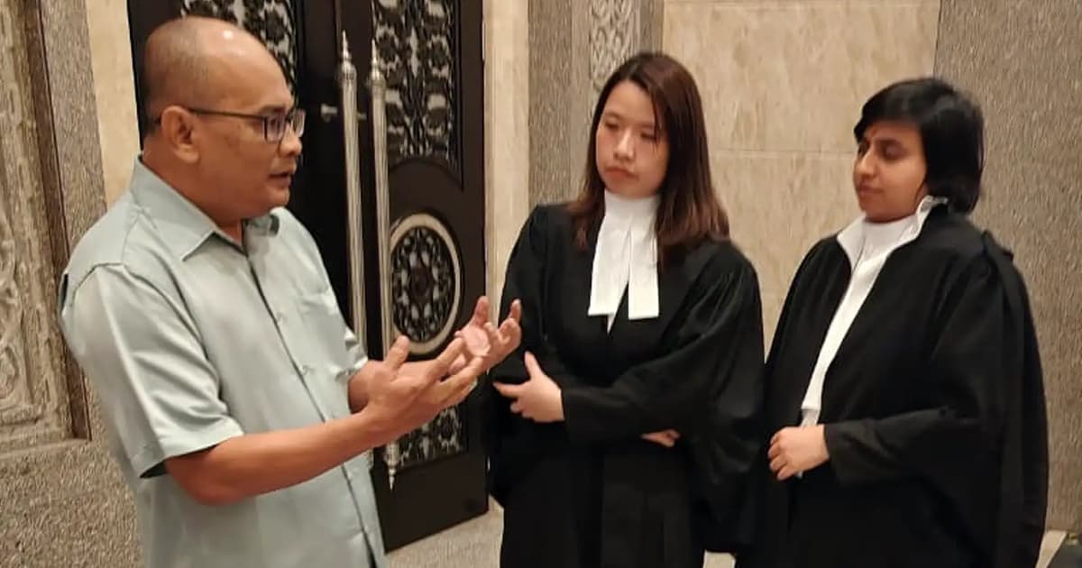 Ex-press photographer wins appeal over online post against police