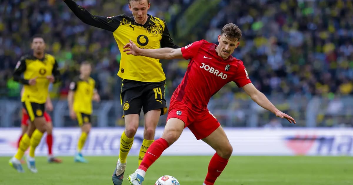 Dortmund down Freiburg to seal Champions League spot