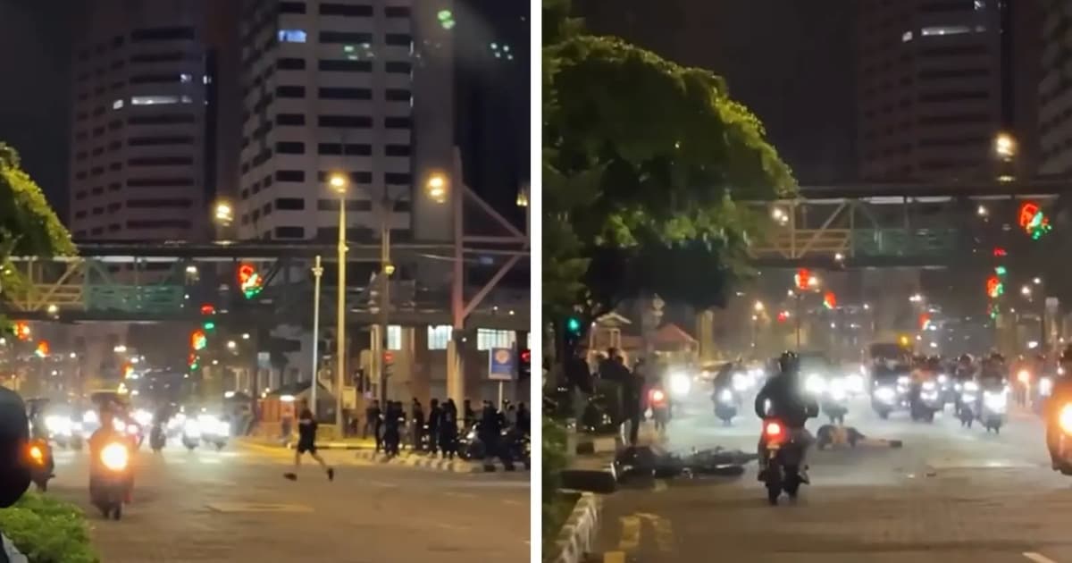 NZ man in hospital after collision with m-cyclist while crossing road