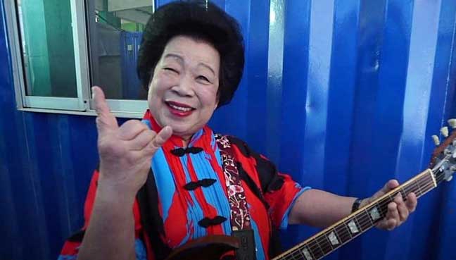 Guitar-slinging Singapore granny shreds stereotypes