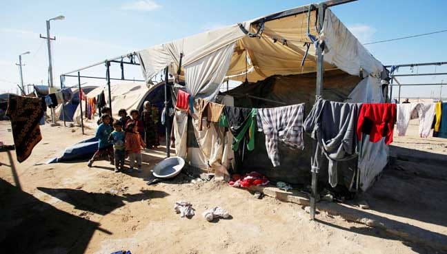 Iraq returning displaced civilians from camps to unsafe areas