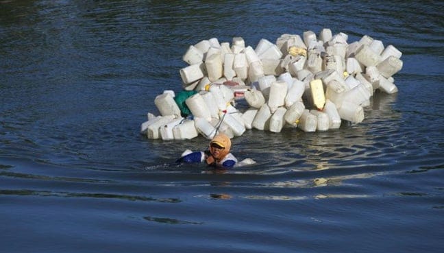 Indonesia women face daily swim for clean water