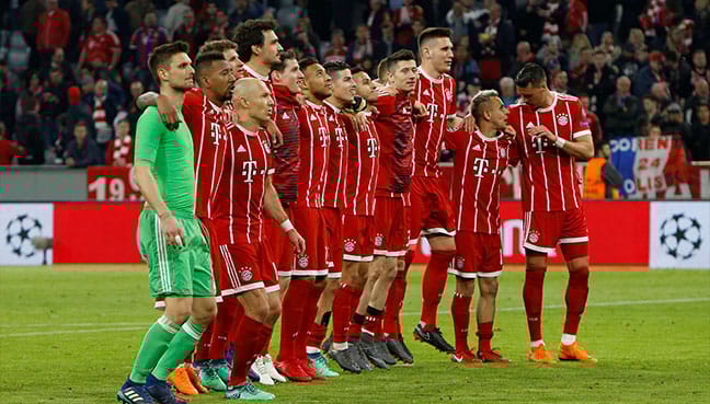 Bayern toil but overcome Sevilla to reach semi-finals