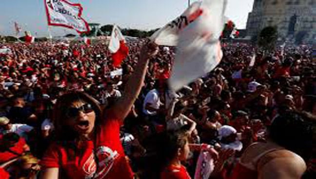 Supporters cheer Maltese leader as government faces pressure after journalist murder