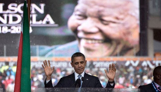Obama warns of ‘strange and uncertain times’ in Mandela tribute