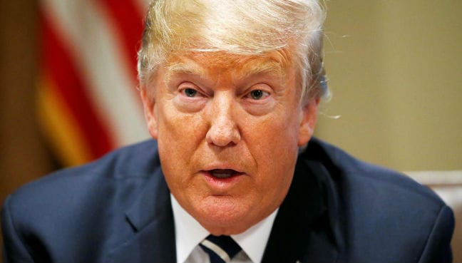 Trump warns Iran to “never, ever threaten” US or suffer consequences