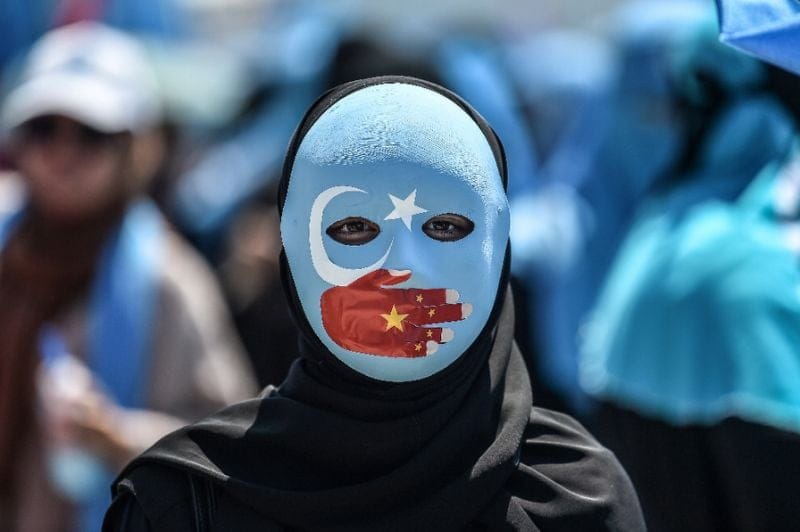 China rejects Turkey criticism on Uighurs, denies poet died