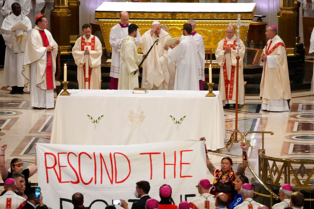 Pope Francis’ Mass interrupted by 15th-century doctrine protest