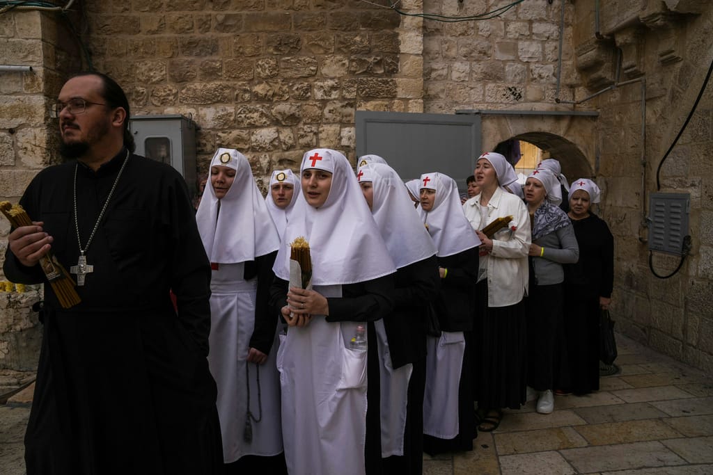 Israel’s Orthodox Christians await Holy Light under heavy police presence