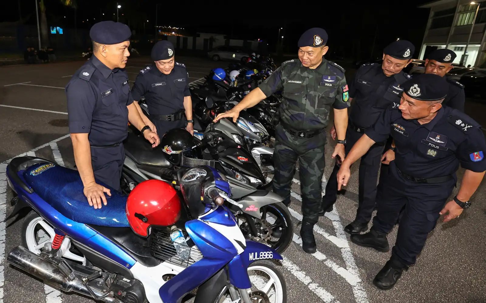 Johor police chief Ab Rahaman Arsad (third from left)