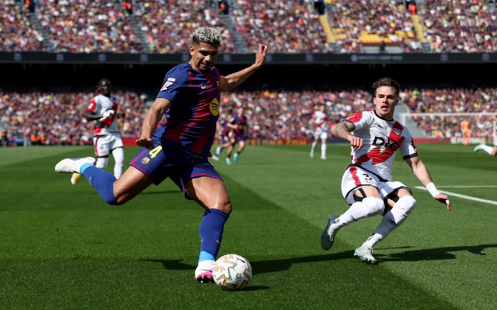 Araujo header gives Barca win over Rayo