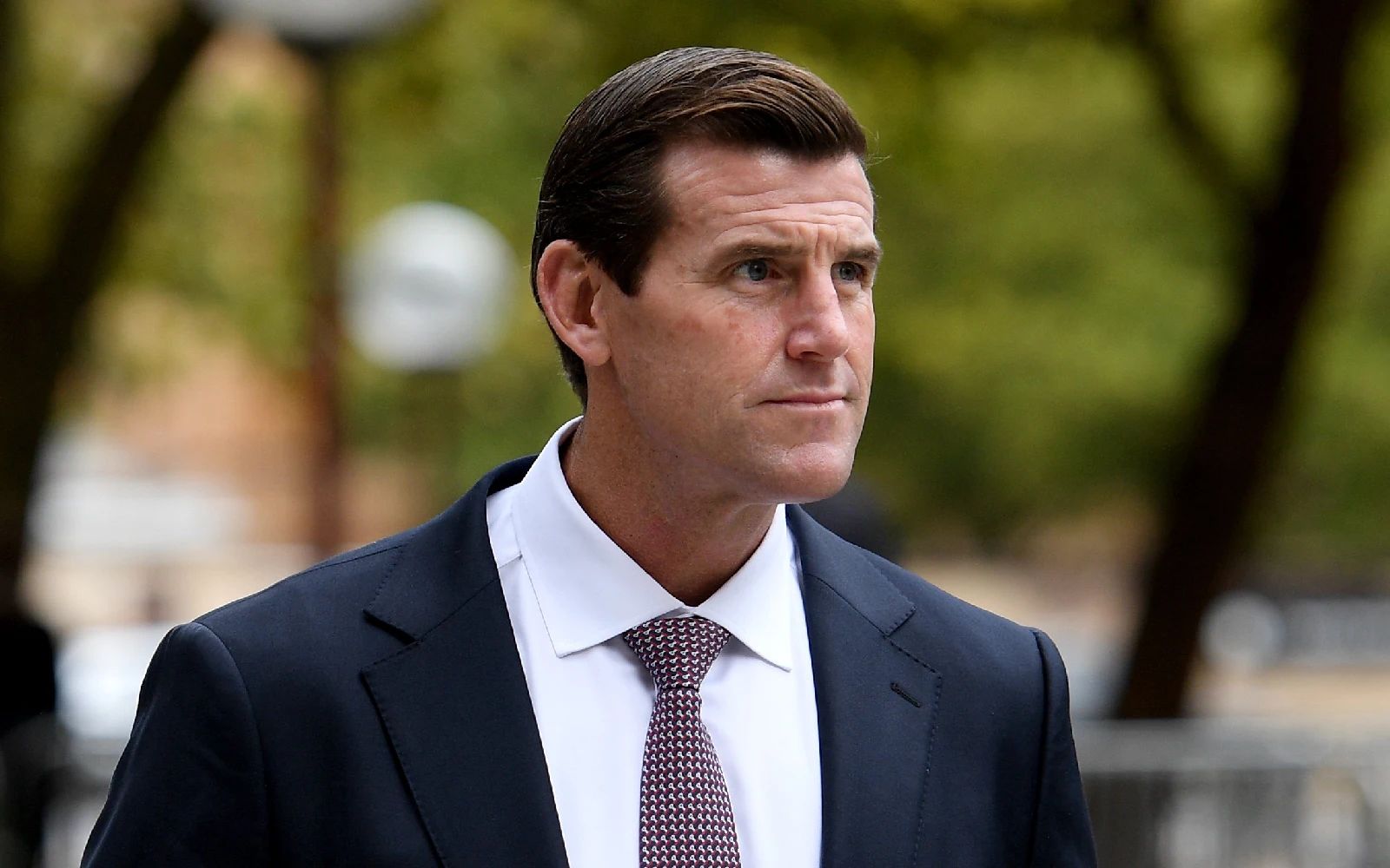 Ben Roberts-Smith leaves the Federal Court in Sydney, Australia, 17 March 2022. Roberts-Smith is suing three former Fairfax newspapers over articles he says defamed him in suggesting he committed war crimes in Afghanistan between 2009 and 2012. EPA/DAN HIMBRECHTS AUSTRALIA AND NEW ZEALAND OUT