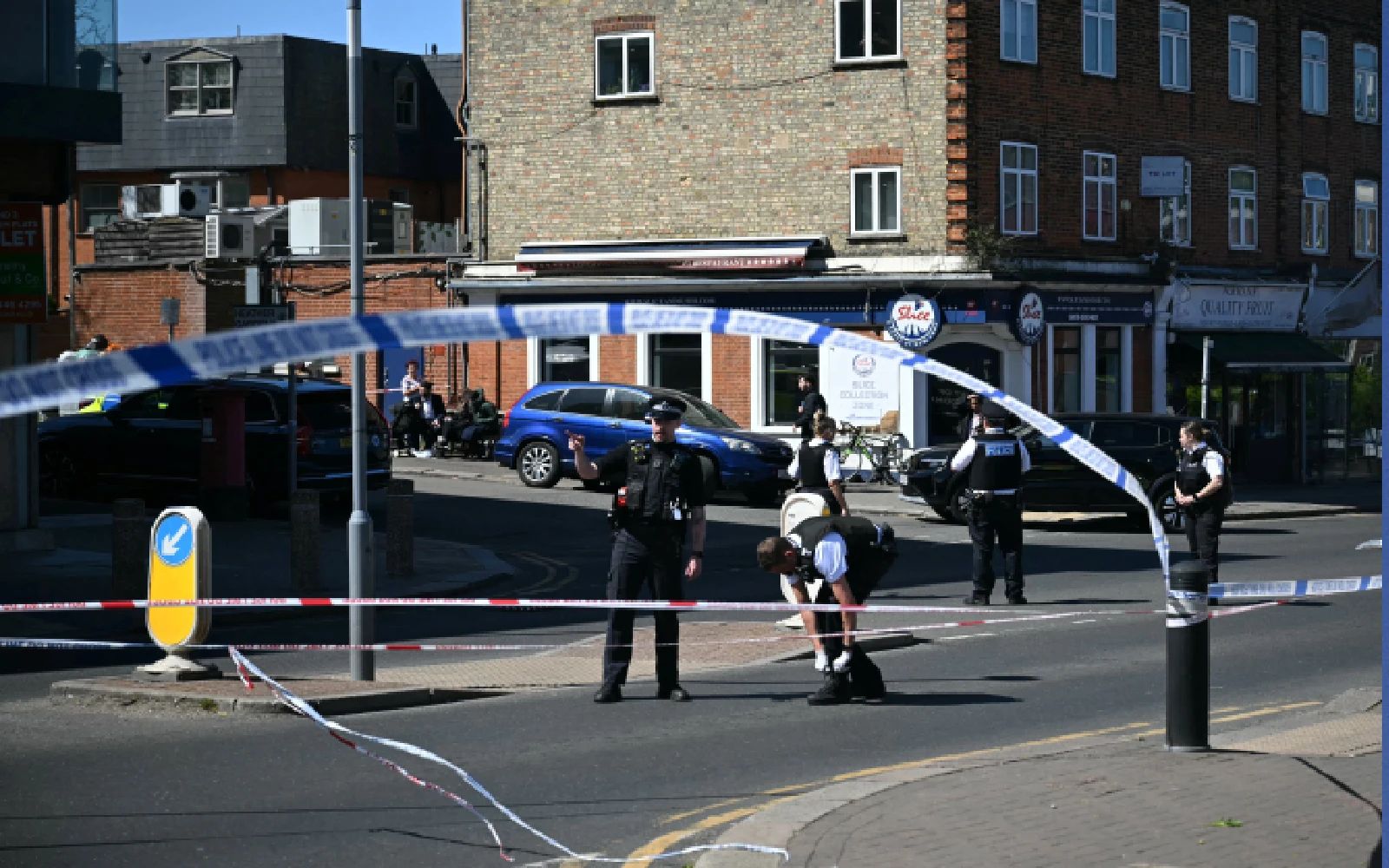 Police investigate a cordoned off area in the Golders Green neighbourhood of north London on April 29, 2026, following the stabbing to two people nearby.