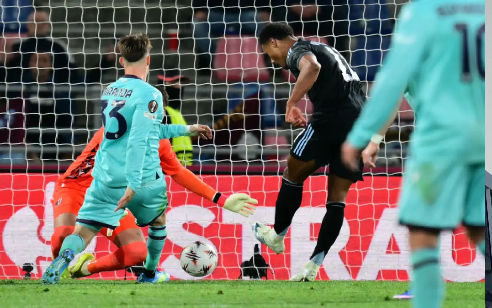 Aston Villa's English striker #11 Ollie Watkins scores his team's third goal during the UEFA Europa League quarter final first leg football match between Bologna and Aston Villa at the Renato Dall'Ara stadium in Bologna on April 9, 2026. (Photo by Stefano RELLANDINI / AFP)