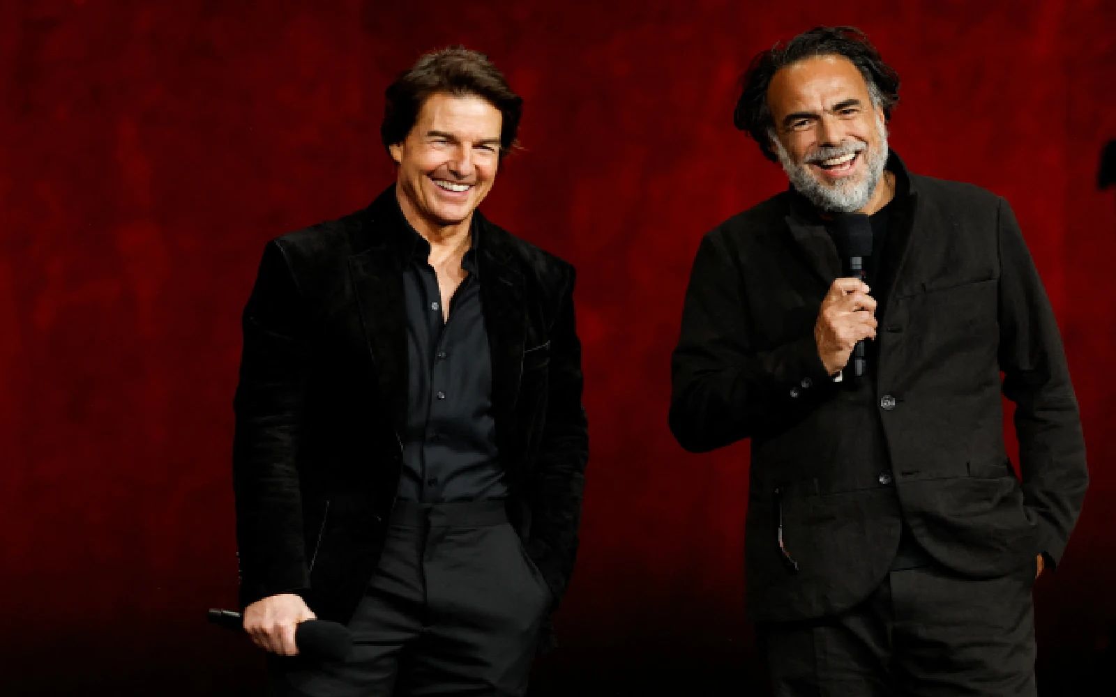Cast member Tom Cruise and director Alejandro Gonzalez Inarritu of the upcoming film "Digger" speak during the Warner Bros. Pictures presentation at CinemaCon, the official convention of Cinema United, in Las Vegas, Nevada, U.S., April 14, 2026. REUTERS/Caroline Brehman