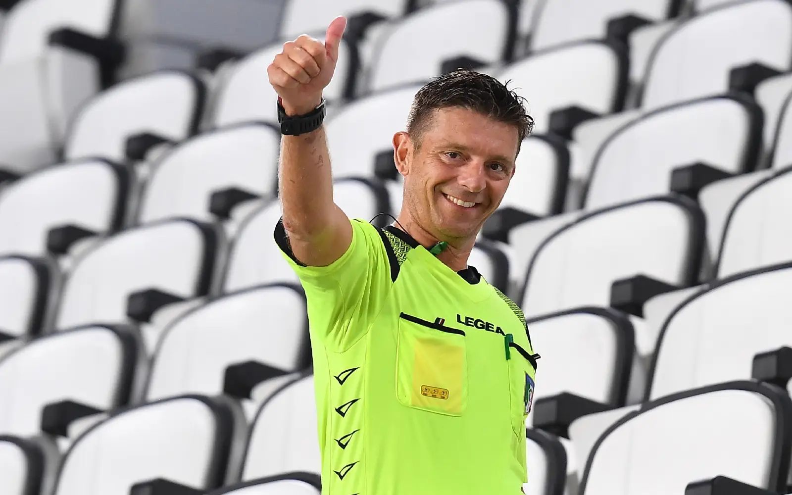 Referee Gianluca Rocchi gives the thumb up from the grandstands during the Italian Serie A soccer match Juventus FC vs AS Roma at the Allianz stadium in Turin, Italy, 01 August 2020. EPA/ALESSANDRO DI MARCO