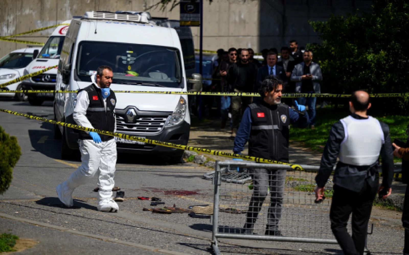 Police officials gather outside The Israeli Consulate in Istanbul on April 7, 2026, following a shootout between gunmen and police.