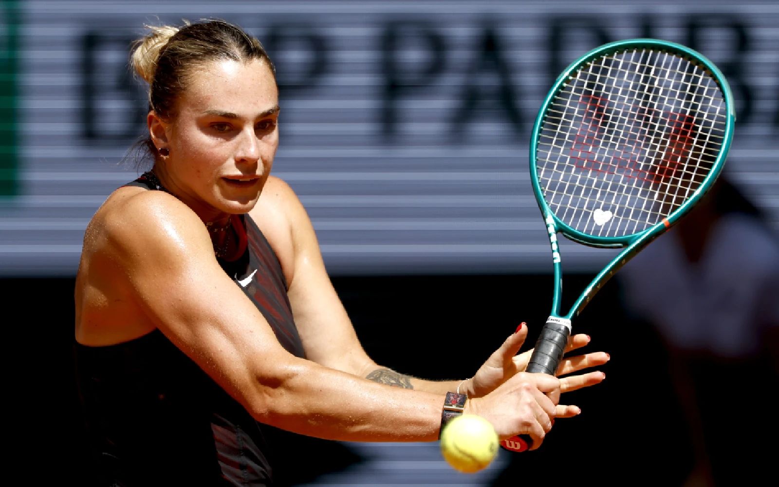 Aryna Sabalenka of Belarus eyes the ball during her Women's 1st round match against Jessica Bouzas Maneiro of Spain at the French Open Grand Slam tennis tournament at Roland Garros in Paris,