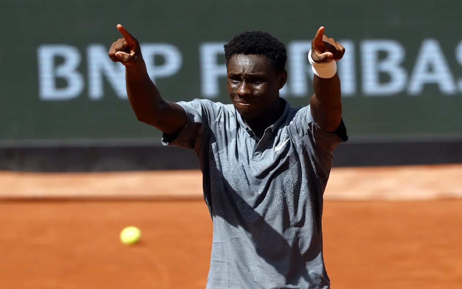 Moise Kouame of France celebrates winning his Men's 2nd round match against Adolfo Daniel Vallejo of Paraguay at the French Open Grand Slam tennis tournament at Roland Garros in Paris, France, 28 May 2026. EPA/YOAN VALAT