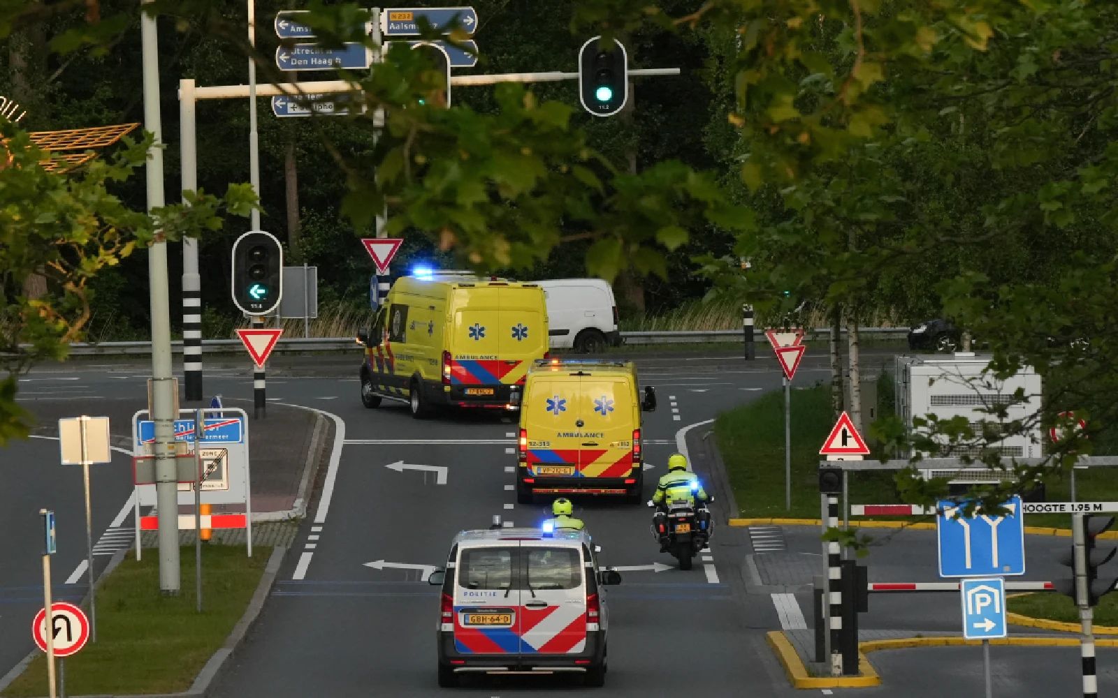 Ambulances allegedly carrying some of the passengers from the cruise ship MV Hondius believed to be infected with hantavirus, is escorted by Police motorcycles as it leaves at Schiphol airport near Amsterdam on May 6, 2026. A plane that left Cape Verde following the evacuation of a cruise ship hit by the hantavirus landed in Spain's Canary Islands on May 6, while a second flight headed for the Netherlands.