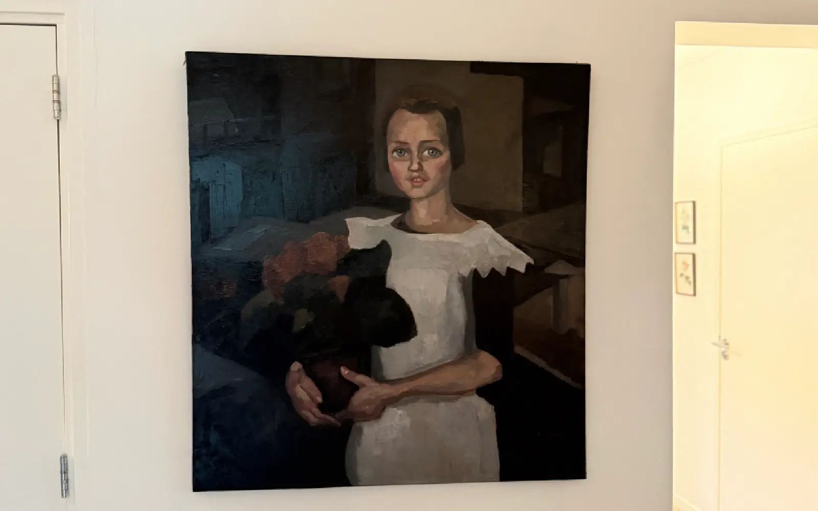 This handout photograph taken in an undisclosed area and released by Arthur Brand on May 11, 2026, shows the painting "Portrait of a Young Girl" by Dutch artist Toon Kelder, an art piece stolen from the world-famous Goudstikker collection by the Nazis, discovered in the house of the descendants of a notorious Dutch SS collaborator.