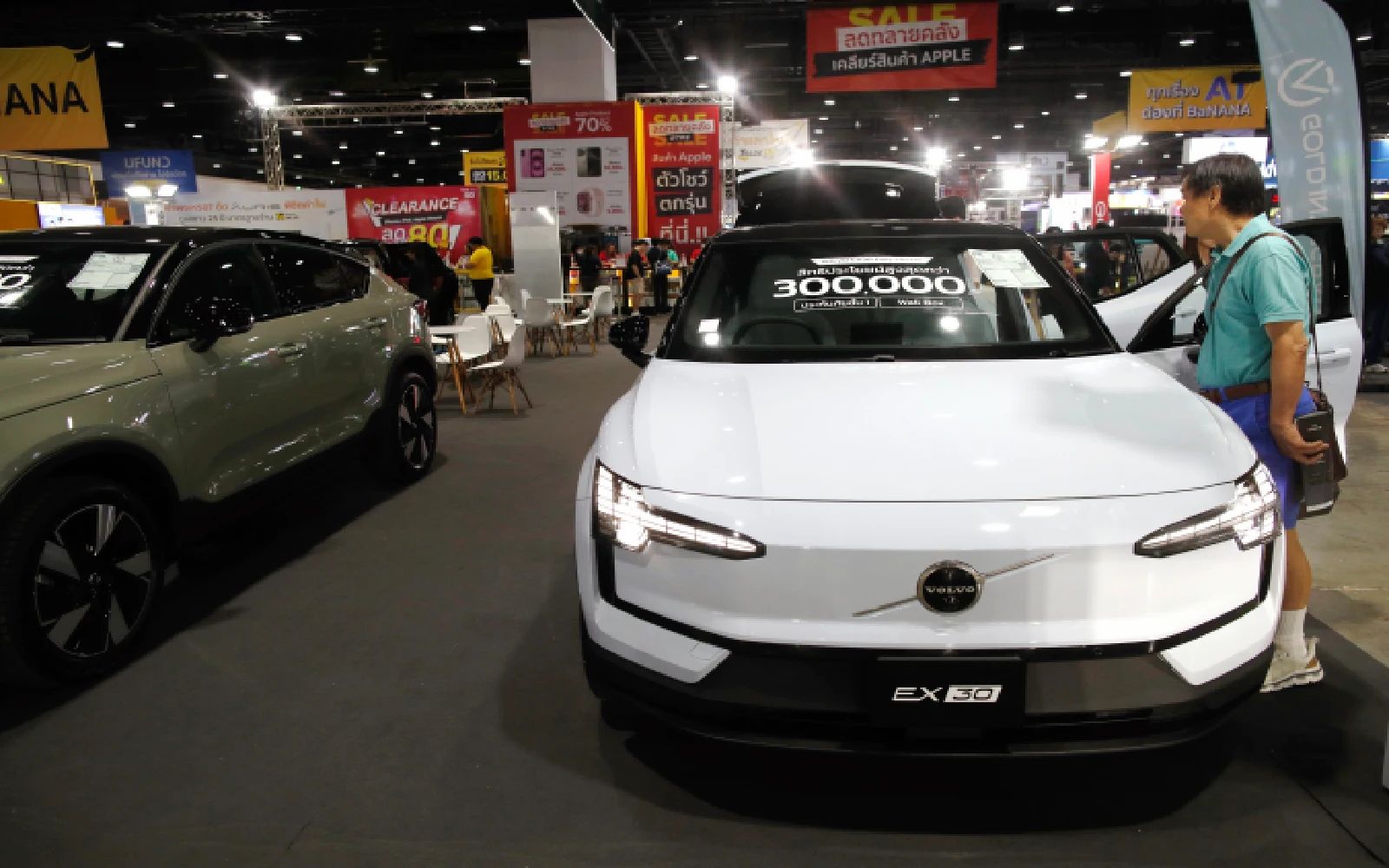 A potential customer inspects a Volvo EX30 electric vehicle at the Bangkok EV Expo 2025 in Bangkok, Thailand, 24 October 2025. The event showcases various electric car brands. EPA