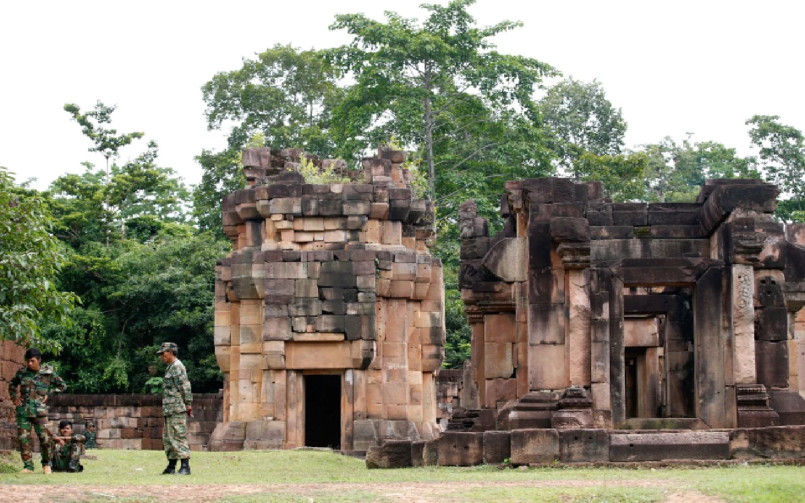 A photo made available on 01 August 2015 shows Cambodian soldiers on duty during the Thai-Cambodian soldiers cooperated positioned at the two countries territory dispute of Ta Muen Thom temple, Phanom Dong Rak district, Surin province, Thailand, 31 July 2015. Thai and Cambodian soldiers positioned and each taking care one half of the disputed ancient temples of Ta Kwai and Ta Muen Thom straddling in the common border and both are claimed by the two countries while the two sides recognized the process of land delineation is complicated. EPA/RUNGROJ YONGRIT
