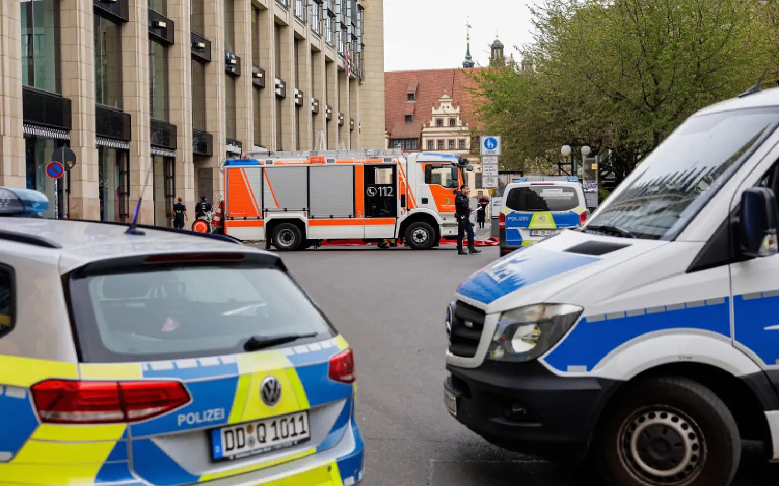 Members of the emergency services work at the scene where a car ploughed into people on a street leaving at least two dead and several injured, in the city centre in Leipzig, eastern Germany on May 4, 2026. Leipzig mayor Burkhard Jung confirmed the deaths, adding nothing was known about the motive of the vehicle driver. Police said the driver had been arrested and no longer posed a danger.