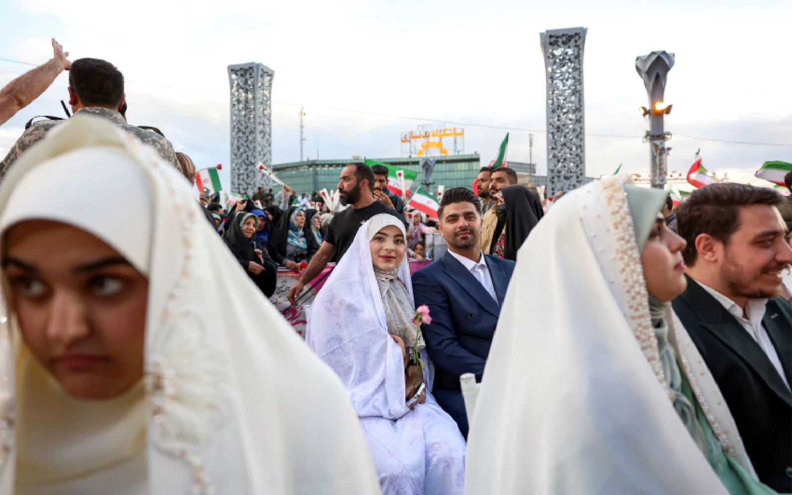 Iran stages mass weddings for couples ready for war ‘sacrifice’