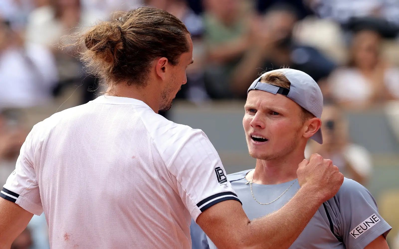 Alexander Zverev of Germany (L) reacts with Jesper de Jong of the Netherlands after winning his Men's 4th round match at the French Open Grand Slam tennis tournament at Roland Garros in Paris, France, 31 May 2026. EPA/TERESA SUAREZ