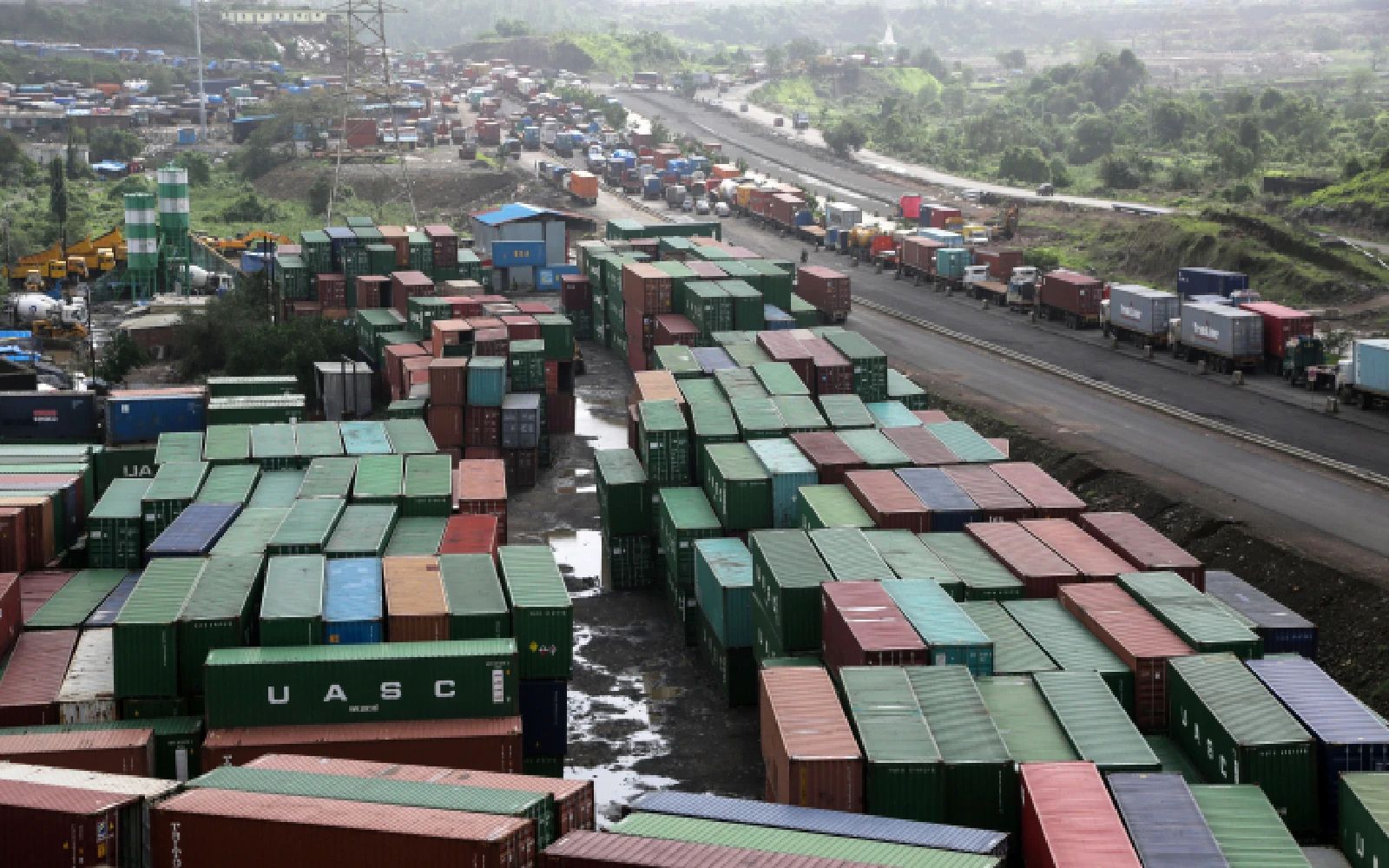 cargo containers piled up near Jawaharlal Nehru Port Trust (JNPT), outskirts of Mumbai, India