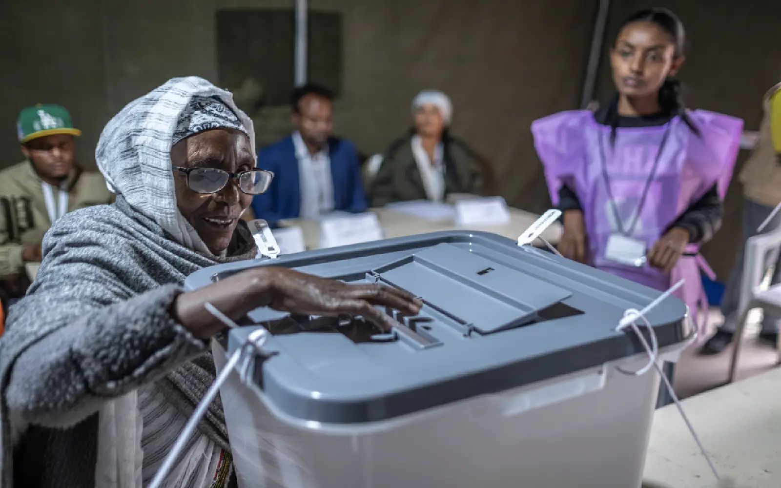 A voter casts her ballot at Shalla Park polling station in Addis Ababa, on June 1, 2026, during the 2026 Ethiopian parliamentary elections. Ethiopians began voting on June 1, 2026 in parliamentary elections, with the party of outgoing Prime Minister Abiy Ahmed, who is running for another term, expected to win. Around 50 million voters are eligible to vote in the election for members of parliament, who will in turn select the prime minister.