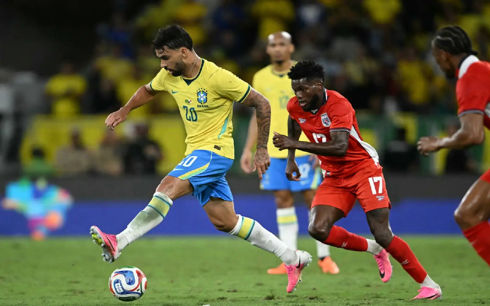 Brazil's midfielder #20 Lucas Paqueta and Panama's forward #17 Jose Fajardo fight for the ball during the international friendly football match between Brazil and Panama at the Maracana stadium in Rio de Janeiro, Brazil on May 31, 2026. (Photo by Mauro PIMENTEL / AFP)