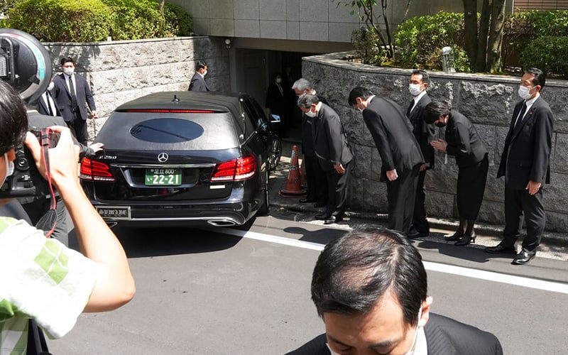 Japan mourns as body of assassinated ex-PM Abe arrives in Tokyo