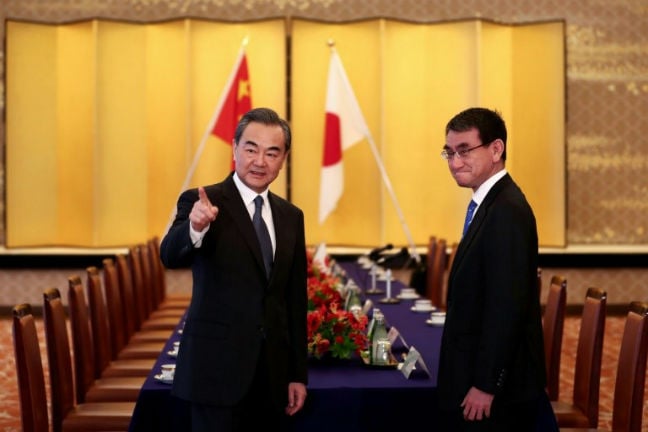 China FM visits Japan for talks on N. Korea, regional issues