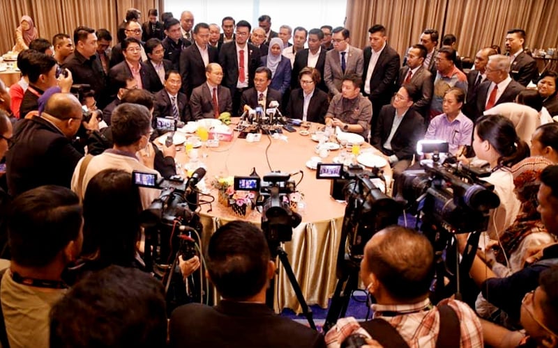 Shafie playing it safe by supporting both Dr M and fed govt, say analysts
