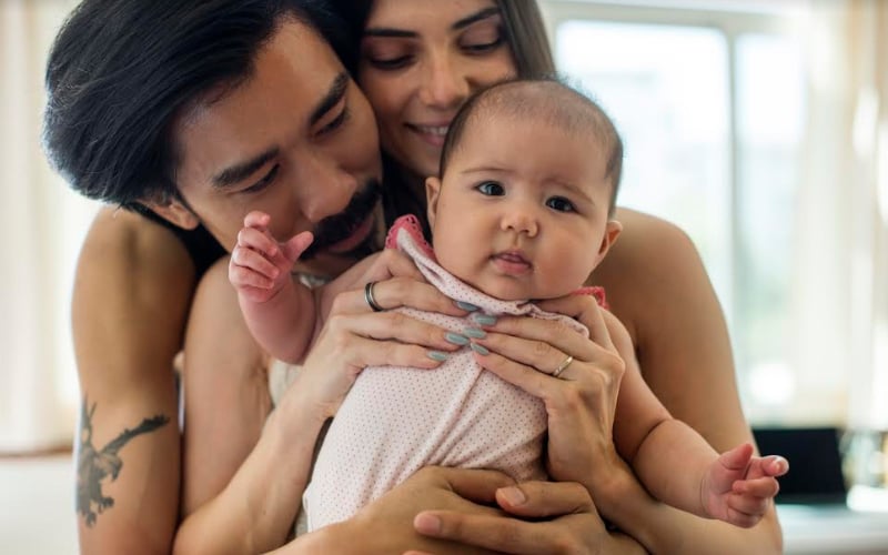 A hug from mom or dad can calm baby, and parents too