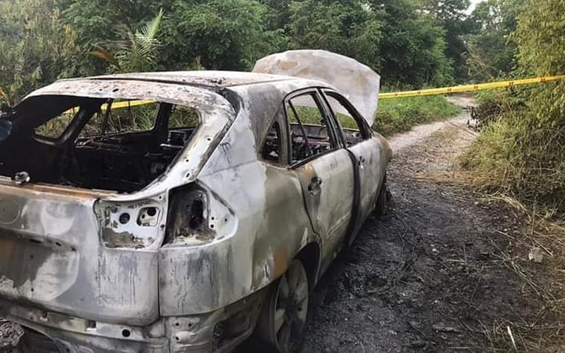 Cops detain 2 men over charred remains in car found in Sepang