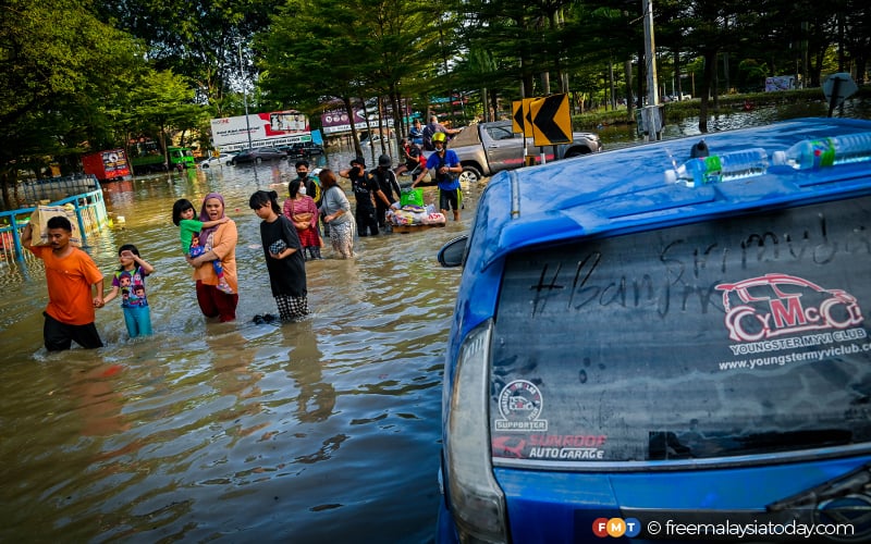 Singapura sumbang wang, bantu mangsa banjir di Malaysia, taufan Filipina
