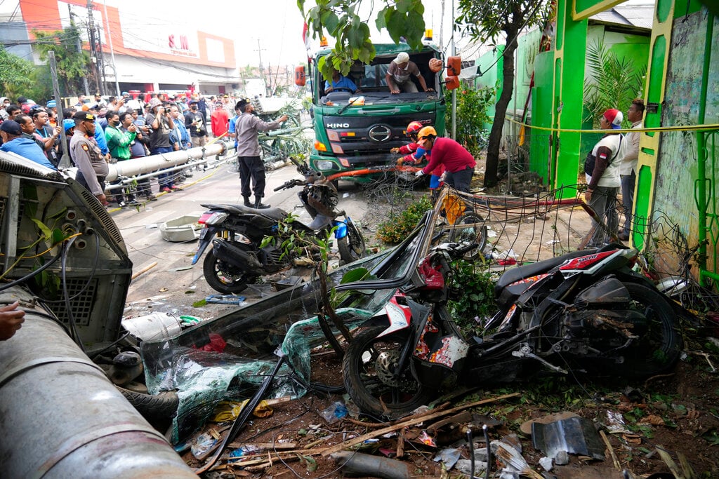 Truck crash outside Indonesian school kills 10, including students