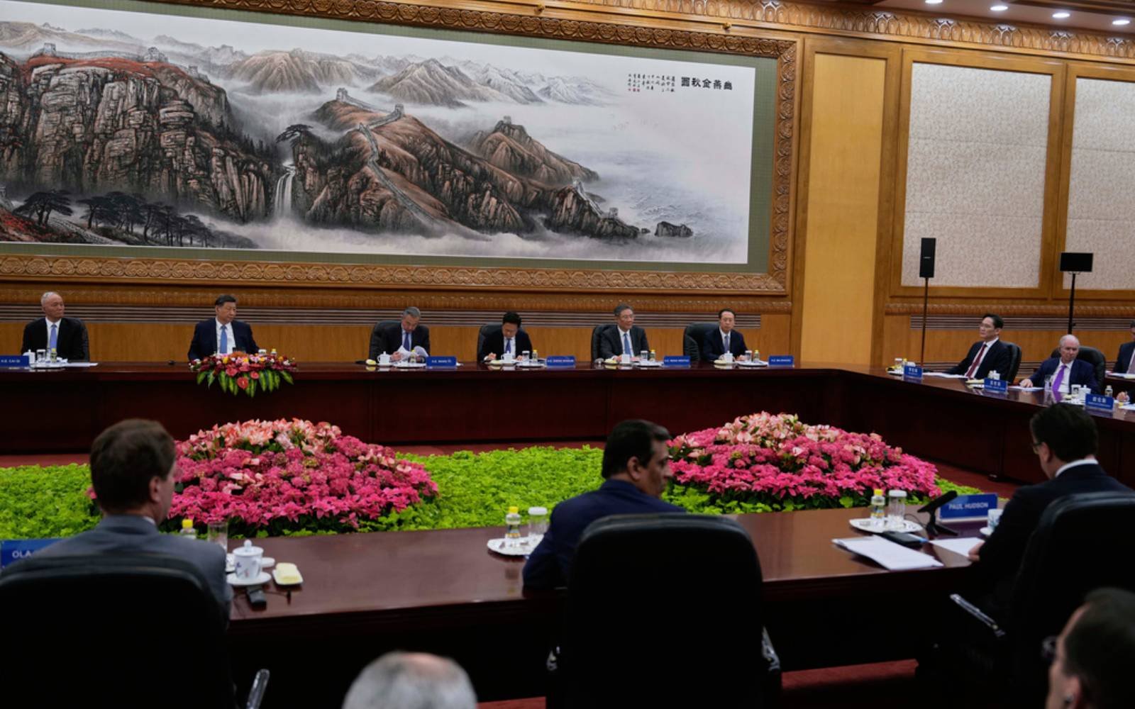 China’s door will ‘open wider and wider’, Xi tells foreign executives