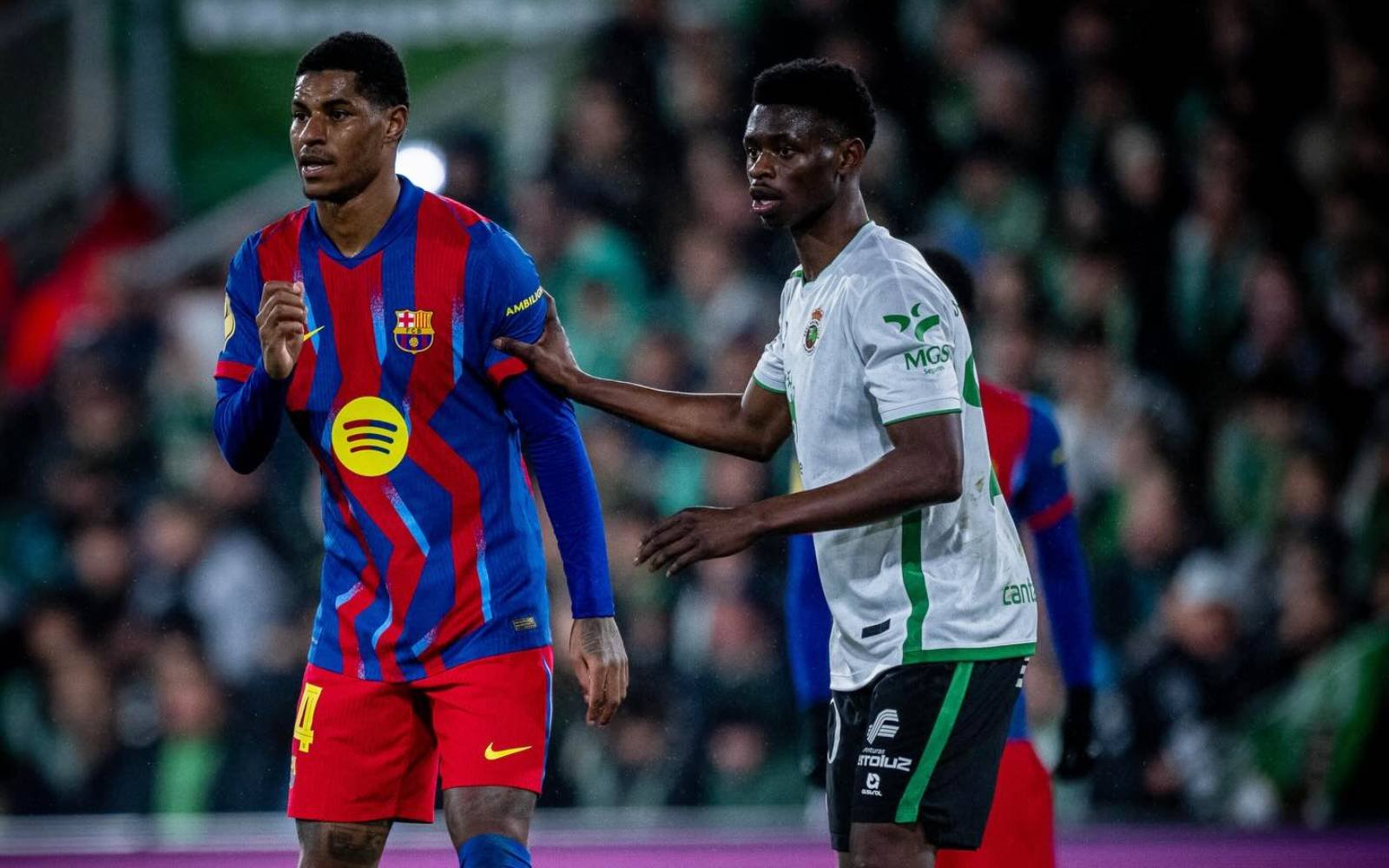 Barca edge Racing Santander to reach Copa del Rey quarters