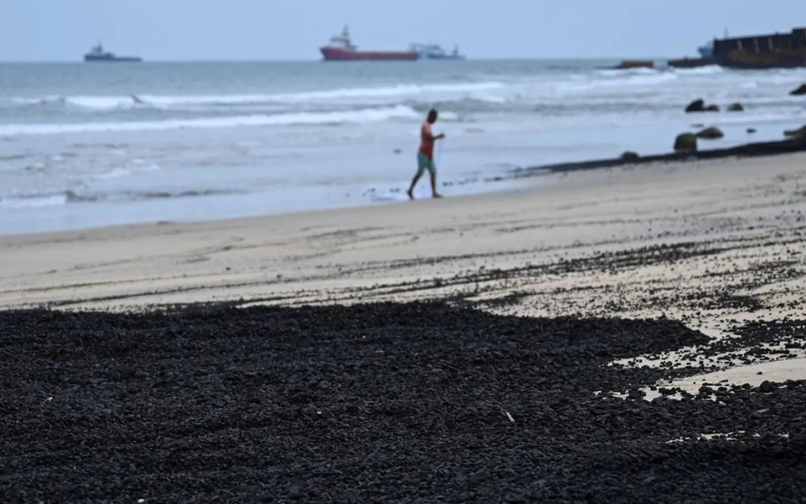 Coal spill cleanup at Teluk Kalong beach to take a month