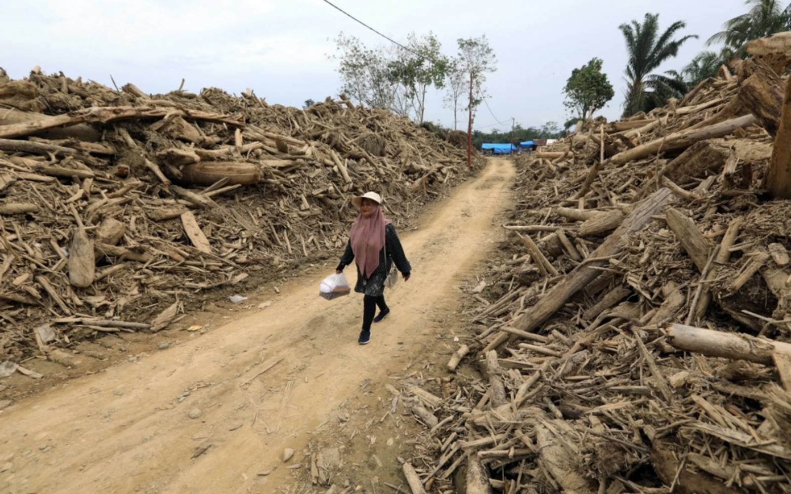 Months after floods, Indonesian survivors frustrated by slow response
