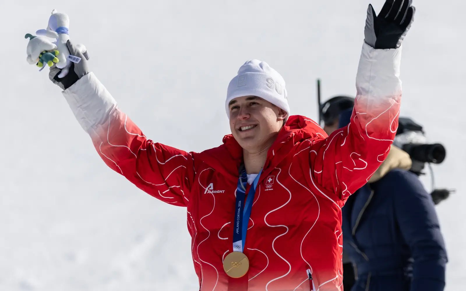 Swiss racer Von Allmen wins first gold of Winter Olympics
