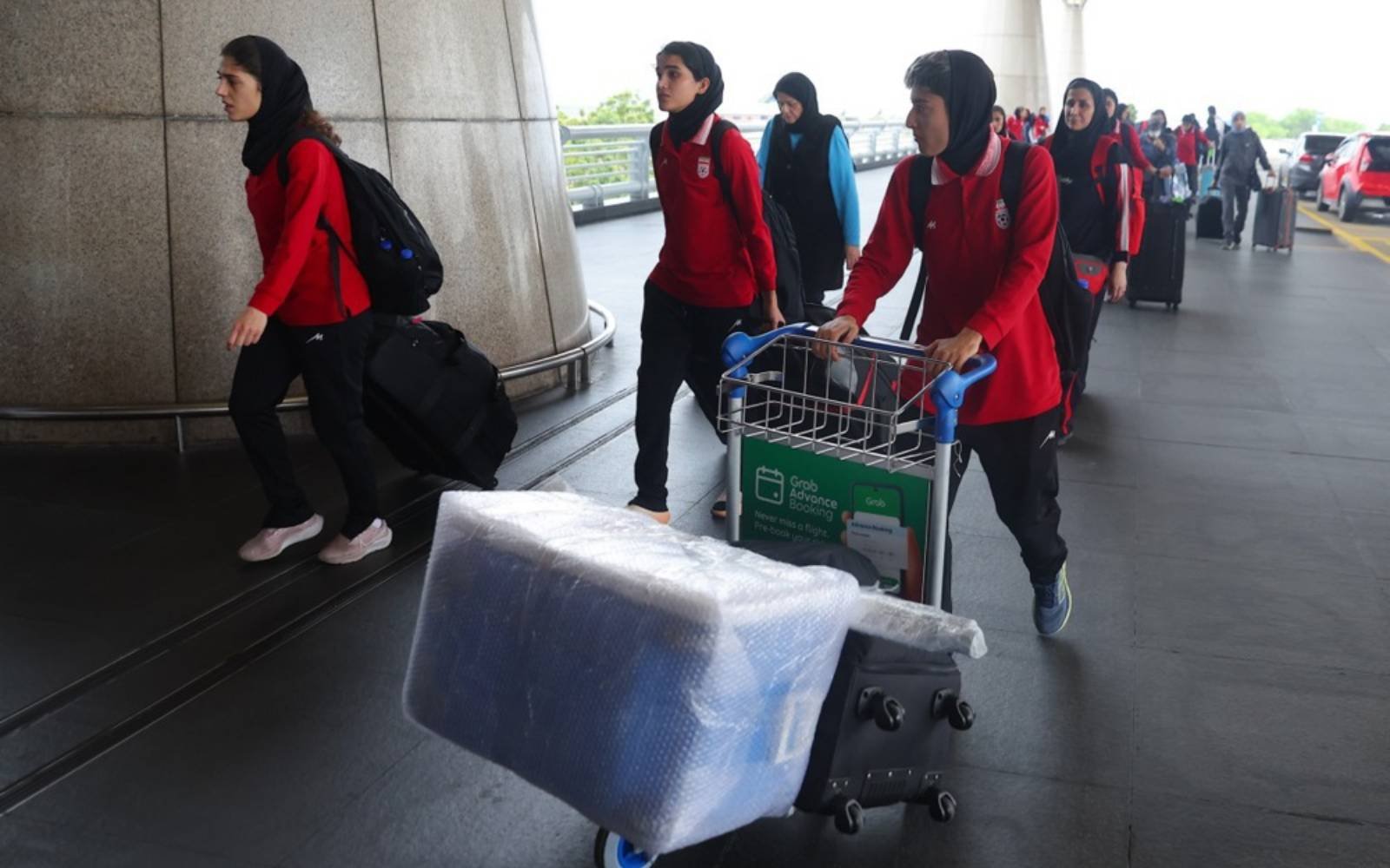Iranian women’s football team return after asylum tussle