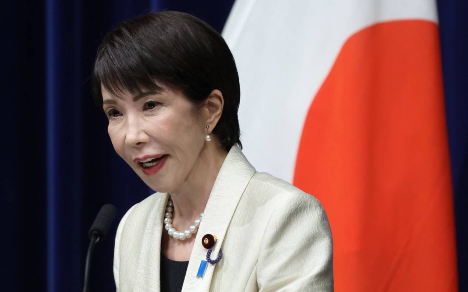 Bank of Japan says it sees inflation rising on oil price spike